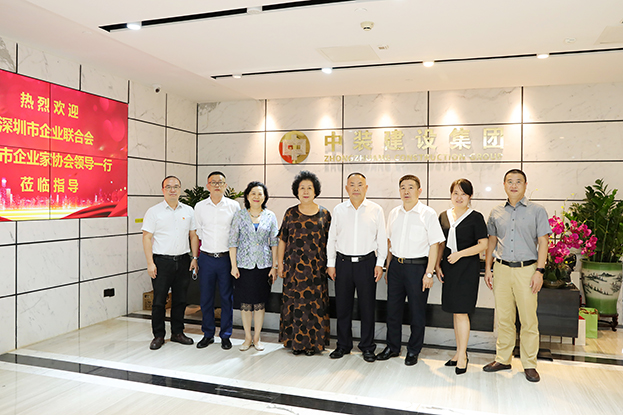 第四届“深圳百名行业领军人物”评委会领导走访官方网站（中国）官网